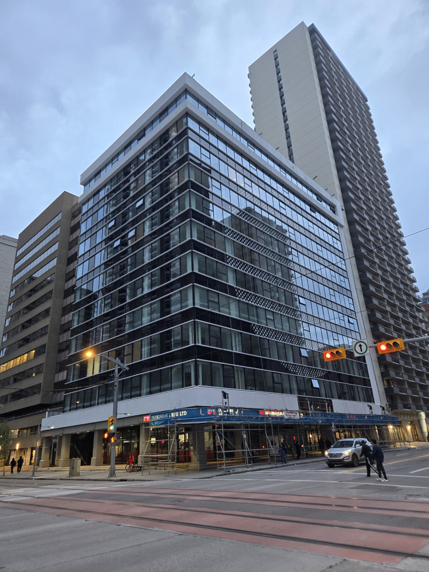 Dominion Centre flooring installation in Calgary — 132 Residential Units · LVP, Tile, Carpet & Rubber · Calgary